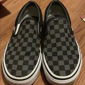 Gray and black checkerboard vans
